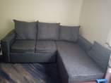 A picture of L shaped pullout sofa bed