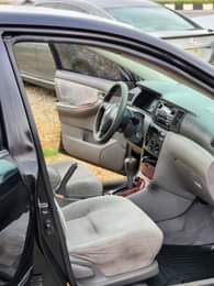 A picture of EXTREMELY SHARP PRE OWNED 2004 TOYOTA COROLLA LE CLEAN INTERIOR
