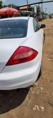 A picture of Sienna Toyota and Honda coupe