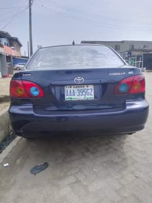 A picture of Toyota Corolla Color Blue Model 2003 Neatly Nigeria used AC