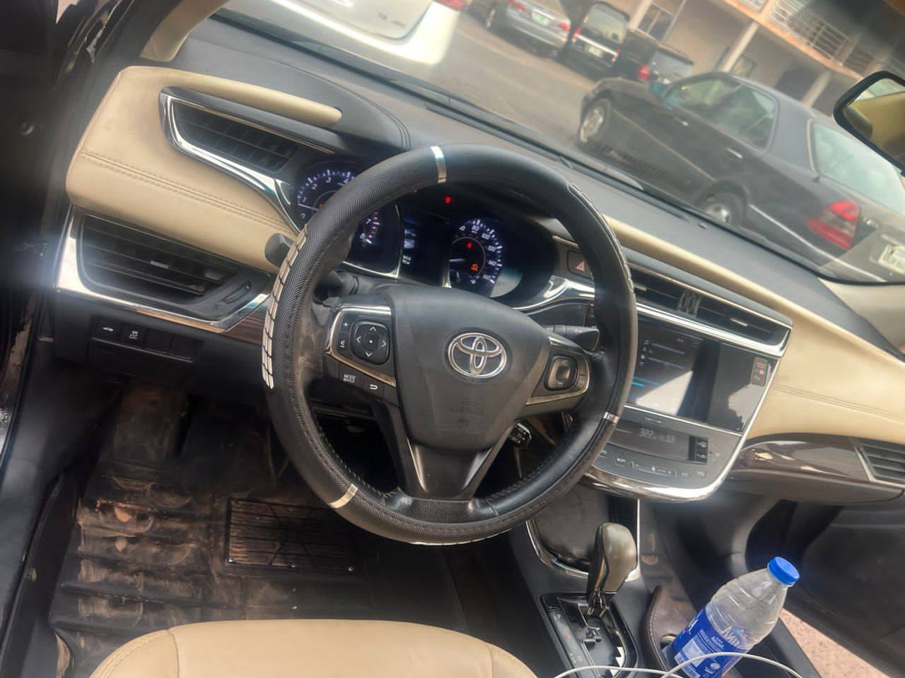A picture of Toyota avalon 2014 everything working perfectly well distress sale location