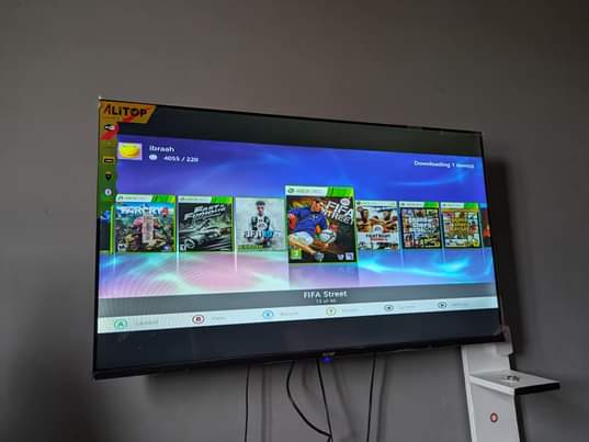 A picture of Xbox 360 2 controllers 20 Games 200k Location kimara kona