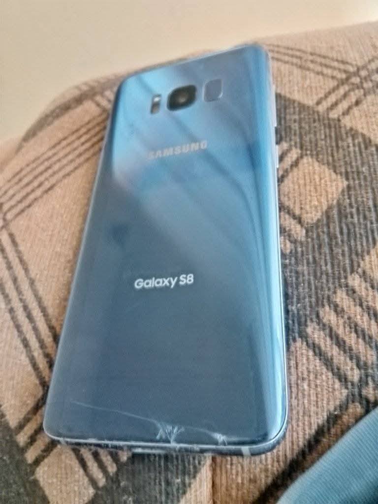 A picture of Samsung Galaxy s8 slightly cracked. 64gb 4gbram clear cameras at