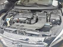 A picture of 2015 model Luxury Hyundai sonata neat creamy fabric Opholstery engine