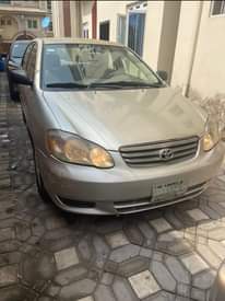 A picture of First Body Toyota corolla 2004 with a sound engine gear