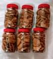 A picture of Crispy cashew nuts original honey spiced kuli kuli