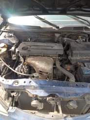 A picture of Blue Toyota Camry big daddy 04 05 V4 engine Engine