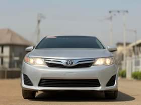A picture of SUPER CLEAN SLIGHTLY USED UNREGISTERED 2014 TOYOTA CAMRY 7 5M