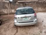 A picture of Toyota matrix 06 Tokunbo standard Pure first body AC chilling