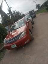 A picture of Toyota 2004 engine grear AC cool painted on first body