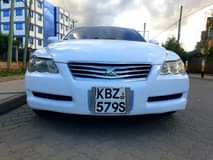 Kamau B.