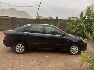 A picture of Very clean first body Bank type manual Toyota Corolla in