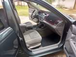 A picture of Sharp 2004 toyota camry 2 4 with 4plugs engine grey