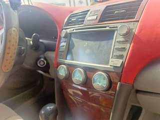 A picture of Toyota Camry 08 AC need gas only 