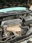 A picture of Toyota camry black ibadan 4plug