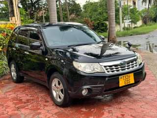 A picture of SUBARU FORESTER GARI MPYA HAINA KIPENGERE FULL DOCUMENT AND AC