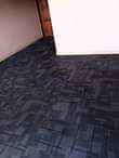 A picture of PVC Tile carpets 45000 per square meter and we also