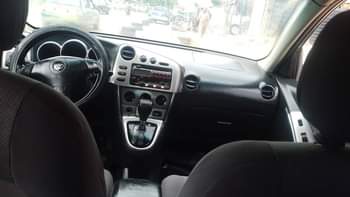 A picture of Toyota matrix is available with good condition untouched engine and