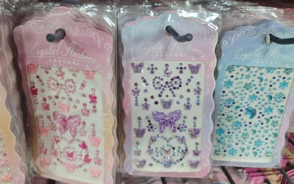 A picture of Rhinestone Stickers Self Adhesive Face Gems Stickers Hair Gems Stick