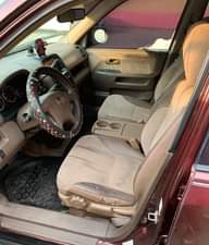 A picture of Clean Nigerian Used Wine Honda CRV 2003 Repainted Fabric interior