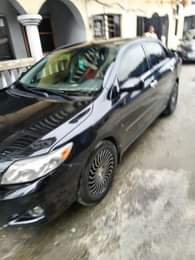 A picture of 2010 Toyota corolla Neatly used with everything very okay and