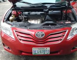 A picture of Toyota Camry 2011 Model Colour Red Low mileage Condition Nigerian