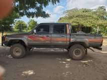 A picture of 1990 TOYOTA Hilux Dark blue