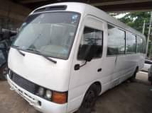 A picture of 2007 Toyota Coaster bus painted Sound engine and gear but