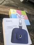 A picture of Earpods pamoja na case yake Bei 18 000tsh tu