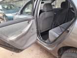 A picture of Toyota Corolla 2004 Engine Gear Ac and body needs attention