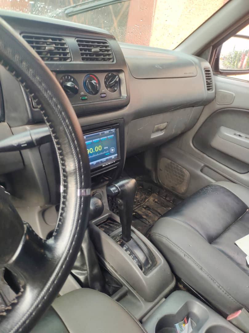 A picture of Nissan frontier with Chilling AC for sale