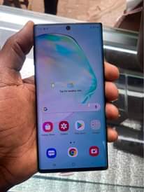 A picture of SAMSUNG GALAXY NOTE10PLUS 256GB EVERYTHING AT 700k 256759443499