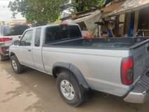 A picture of Nissan frontier 2002 Nigeria used clean body Buy and drive