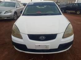 A picture of low budget car 2008 model Kia Rio manual transmission going