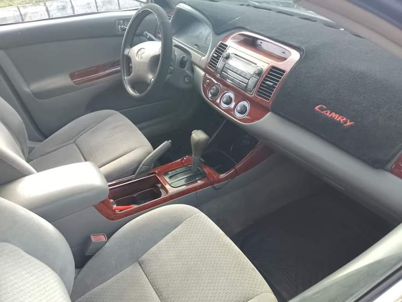 A picture of 2004 Toyota Camry painted on the first body with clean