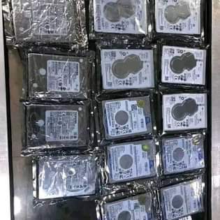 A picture of Laptop desktop and HARDISK