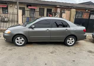 A picture of 2004 Minty Sharp Fresh Tokunbo Toyota Corolla LE