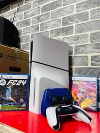 A picture of Sony PS5 slim version combo with 2controllers 2games FIFA and
