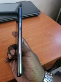 A picture of Still new Samsung galaxy A72 for 500k at my shop...contact