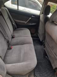 A picture of Make TOYOTA Brand PREMIO Year 2004 Color WHITE Grade 2WD