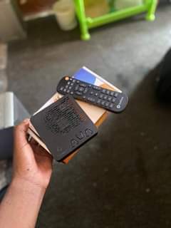 A picture of Startimes decorder and remote