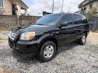 A picture of Brand Honda Model Pilot Year 2006 AC chilling