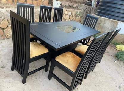 A picture of Sets of dinning center tables TV stand and other