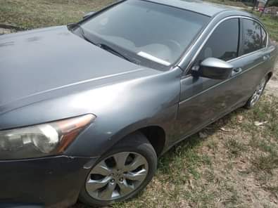 A picture of 2009 Honda Accord Engine has noise Gear and ac is