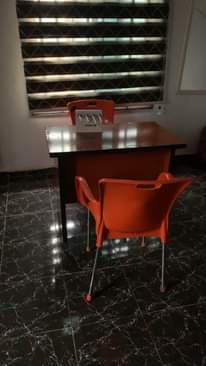 A picture of Office Table with chairs