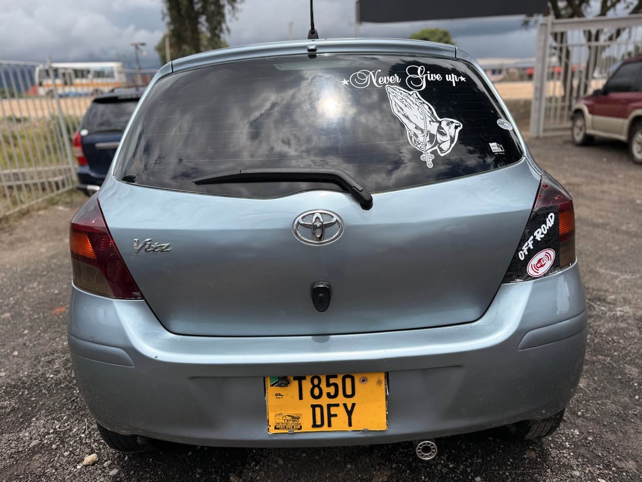A picture of vitz new model Bei 6 5ML 0625764751 ipo MBEYA