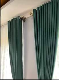 A picture of Curtains rods and nets 0703836818 0776763178.
