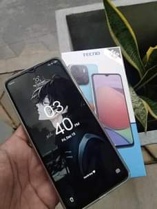 A picture of TECNO pop7 bado mpya CHaji siku 3 ina 64gb fingerprint.