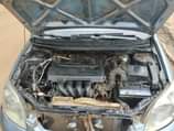 A picture of 2006 Matrix painted on first body pan Engine gear Ac