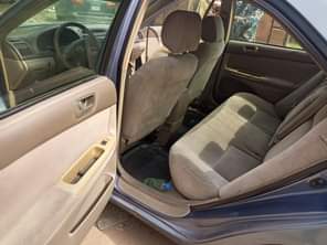 A picture of NEATLY USED 2004 MODEL TOYOTA CAMRY BIG DADDY Absolutely nothing